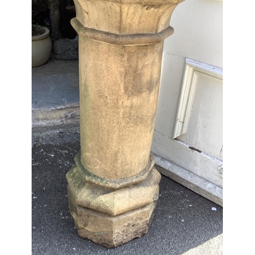 106 - A terracotta chimney pot, stamped base, 131cm high