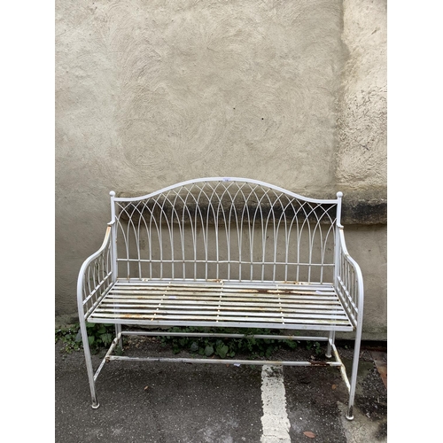 116 - A white, wire-work garden bench, 115cm wide