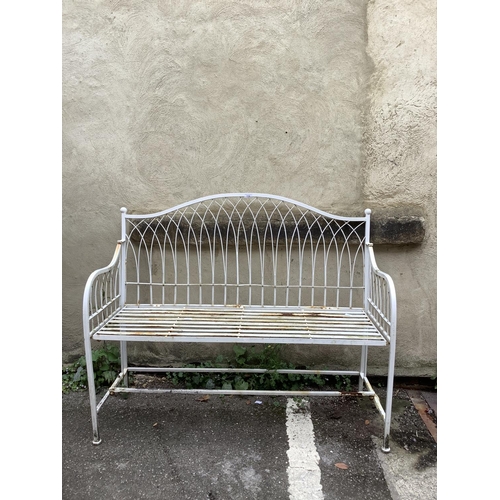 116 - A white, wire-work garden bench, 115cm wide