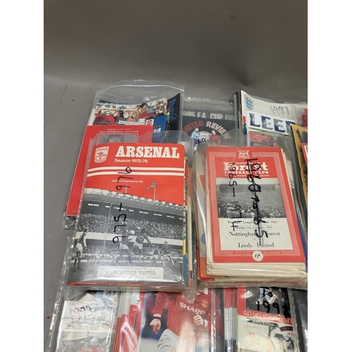 467 - An extensive collection Leeds and Manchester United official Football programmes 1965-2006, together... 