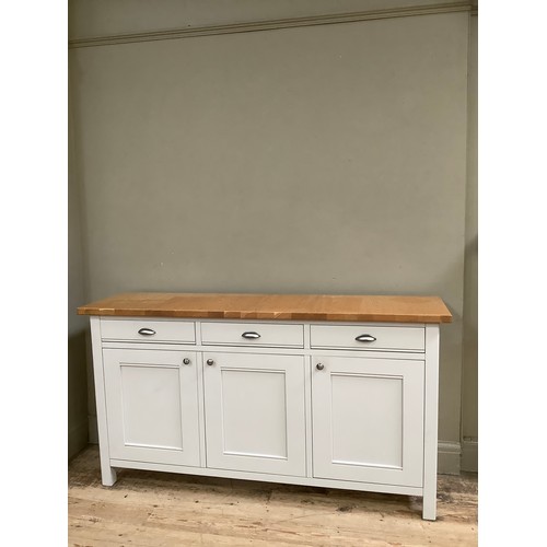 94 - A grey painted and oak topped sideboard having three drawers and three doors with brushed chrome han... 