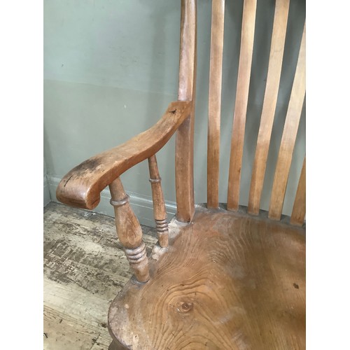 76 - A walnut 19th century kitchen chair on baluster supports and stretcher