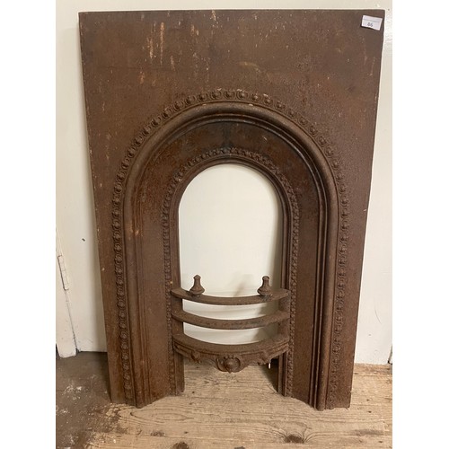 86 - A cast iron fire surround