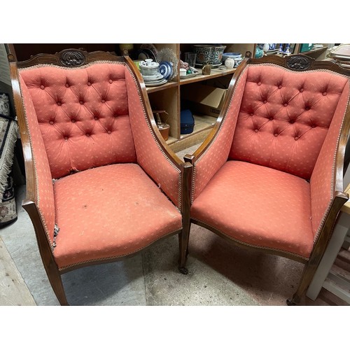 96 - A pair of Edwardian, inlaid, mahogany salon chairs with button backs upholstered in red fabric on ca... 