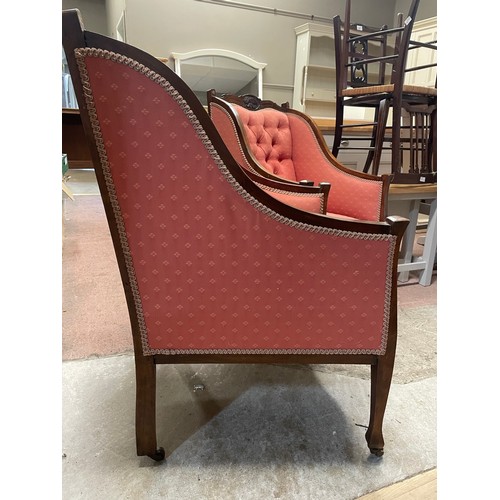 96 - A pair of Edwardian, inlaid, mahogany salon chairs with button backs upholstered in red fabric on ca... 