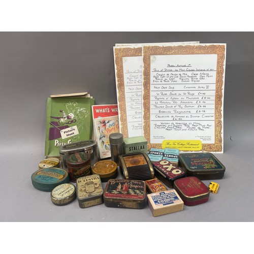 463 - A collection of tins and two vintage menus, vintage games etc