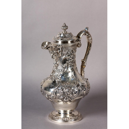 218 - A WILLIAM IV SILVER CLARET JUG EDINBURGH 1837 FOR JAMES HOWDEN AND CO, of baluster form with repouss...