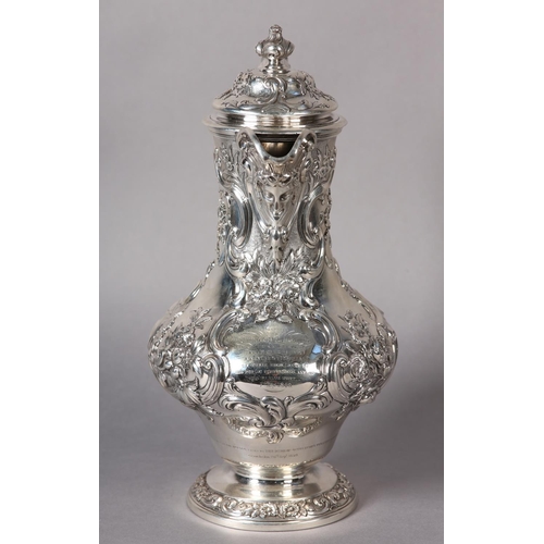 218 - A WILLIAM IV SILVER CLARET JUG EDINBURGH 1837 FOR JAMES HOWDEN AND CO, of baluster form with repouss... 