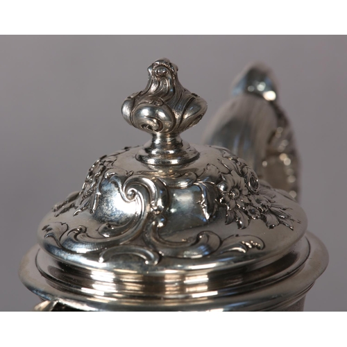 218 - A WILLIAM IV SILVER CLARET JUG EDINBURGH 1837 FOR JAMES HOWDEN AND CO, of baluster form with repouss... 