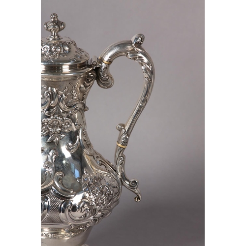 218 - A WILLIAM IV SILVER CLARET JUG EDINBURGH 1837 FOR JAMES HOWDEN AND CO, of baluster form with repouss... 