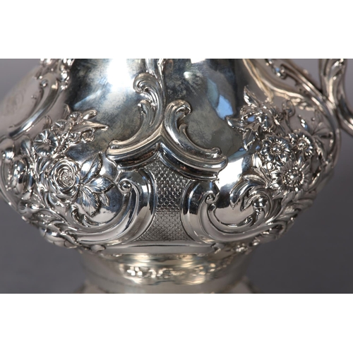 218 - A WILLIAM IV SILVER CLARET JUG EDINBURGH 1837 FOR JAMES HOWDEN AND CO, of baluster form with repouss... 