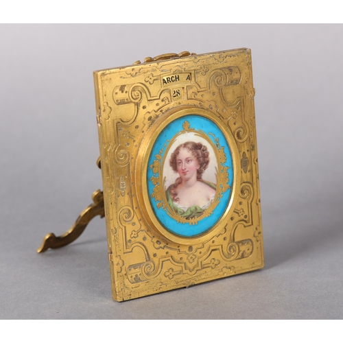 142 - A 19TH CENTURY FRENCH GILT BRONZE PERPETUAL CALENDAR, of rectangular form centered with a Sevres por... 