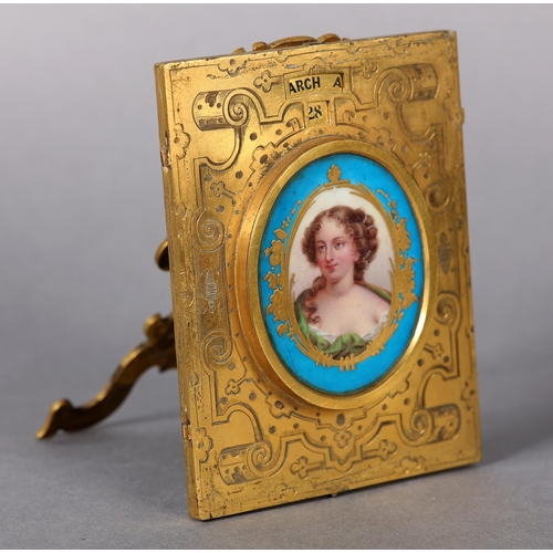 142 - A 19TH CENTURY FRENCH GILT BRONZE PERPETUAL CALENDAR, of rectangular form centered with a Sevres por... 