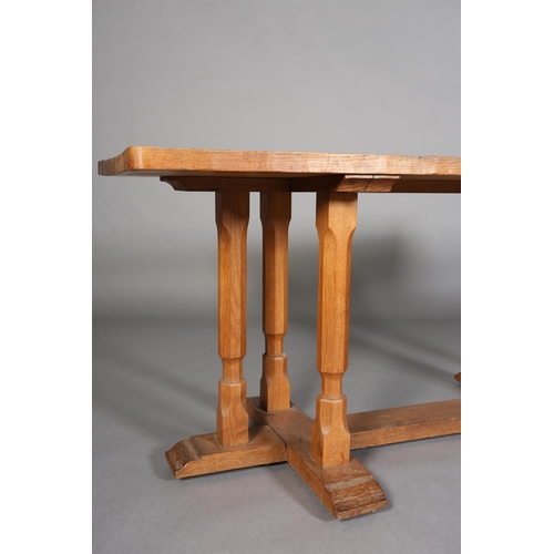 311 - SCHOOL OF THOMPSON OF KILBURN, An adzed oak rectory table c.1940s on triple chamfered leg standards,... 