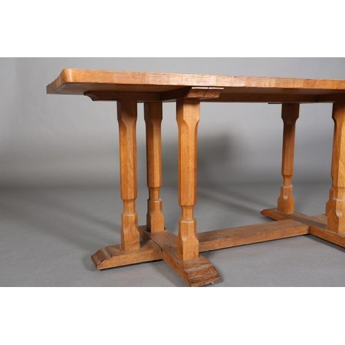 311 - SCHOOL OF THOMPSON OF KILBURN, An adzed oak rectory table c.1940s on triple chamfered leg standards,... 