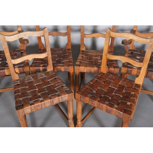 312 - SCHOOL OF THOMPSON OF KILBURN, A set of six oak dining chairs, c.1940s, having an ogee arched top ra... 