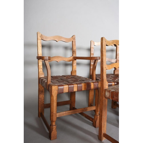 312 - SCHOOL OF THOMPSON OF KILBURN, A set of six oak dining chairs, c.1940s, having an ogee arched top ra... 