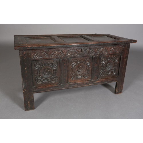 381 - A LATE 17TH/EARLY 18TH CENTURY OAK JOINED CHEST having a triple indented panel top above a frieze ca... 