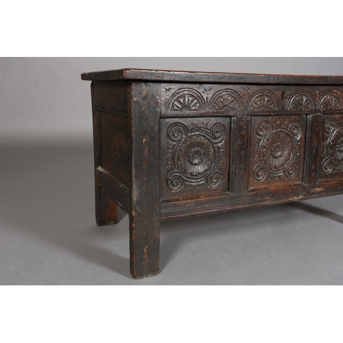 381 - A LATE 17TH/EARLY 18TH CENTURY OAK JOINED CHEST having a triple indented panel top above a frieze ca... 