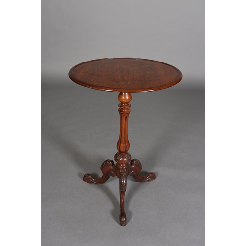 338 - A MID 19TH CENTURY MAHOGANY CIRCULAR TRIPOD TABLE having a recessed surface on a fluted and foliate ... 