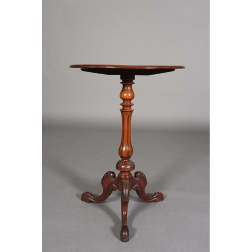 338 - A MID 19TH CENTURY MAHOGANY CIRCULAR TRIPOD TABLE having a recessed surface on a fluted and foliate ... 