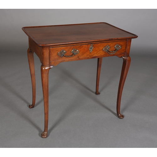 328 - A GEORGE III STYLE WALNUT SIDE TABLE with lipped surface above a frieze drawer, gilt rococco handles... 