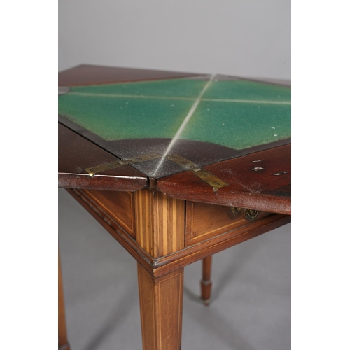 368 - AN EDWARD VII MAHOGANY ENVELOPE CARD TABLE, inlaid with boxwood stringing, the fold-out top lined in... 