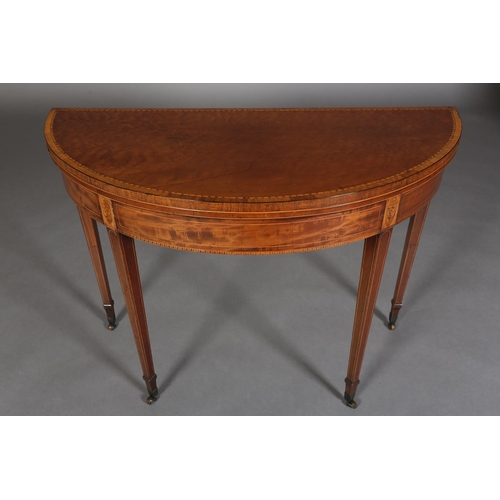 342 - A LATE 18TH CENTURY MAHOGANY DEMI-LUNE FOLD OVER TEA TABLE, crossbanded and inlaid in satinwood with... 