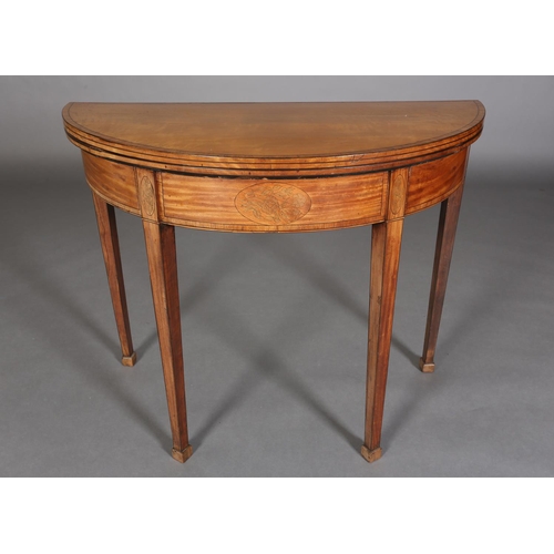 341 - A LATE 18TH CENTURY SATINWOOD DEMI-LUNE FOLD OVER TEA TABLE, crossbanded and inlaid in satinwood wit... 