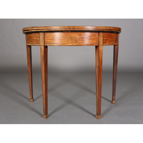 341 - A LATE 18TH CENTURY SATINWOOD DEMI-LUNE FOLD OVER TEA TABLE, crossbanded and inlaid in satinwood wit... 