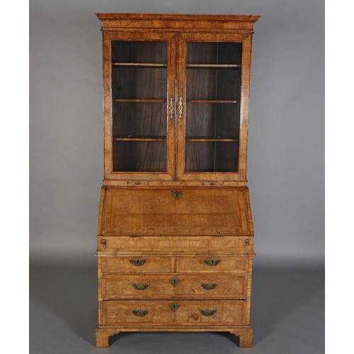 330 - AN EARLY GEORGE III FIGURED WALNUT AND CROSSBANDED BUREAU-BOOKCASE, having a moulded cornice above t... 