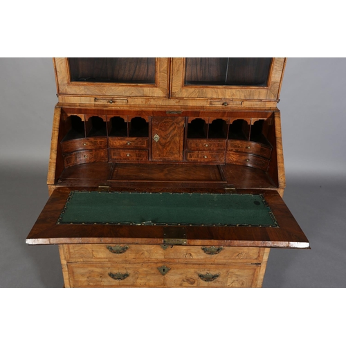 330 - AN EARLY GEORGE III FIGURED WALNUT AND CROSSBANDED BUREAU-BOOKCASE, having a moulded cornice above t... 