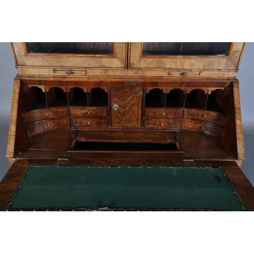 330 - AN EARLY GEORGE III FIGURED WALNUT AND CROSSBANDED BUREAU-BOOKCASE, having a moulded cornice above t... 