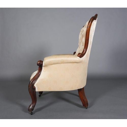 340 - A VICTORIAN MAHOGANY ARMCHAIR HAVING AN ENCIRCLING FRAME, button backed pale apricot fabric upholste... 