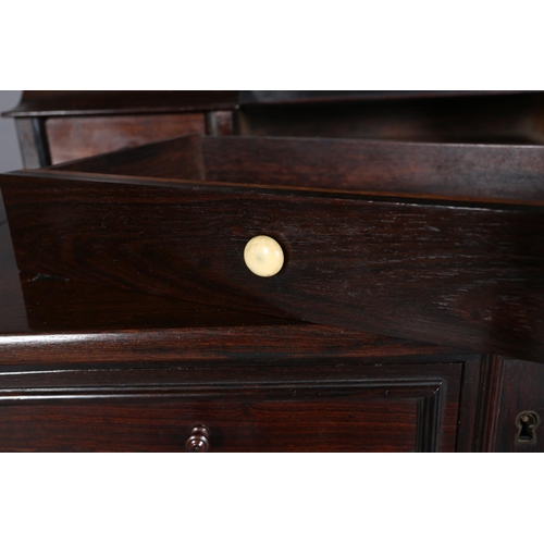 333 - A MID 19TH CENTURY ROSEWOOD SECRETAIRE having an open compartment with four slender turned spindles ... 