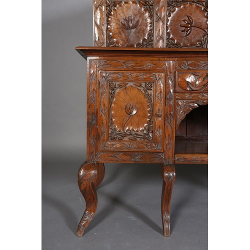 324 - A LATE 19TH CENTURY ANGLO-INDIAN WALNUT SIDEBOARD AND PAIR OF SINGLE CHAIRS, all-over carved in low ... 