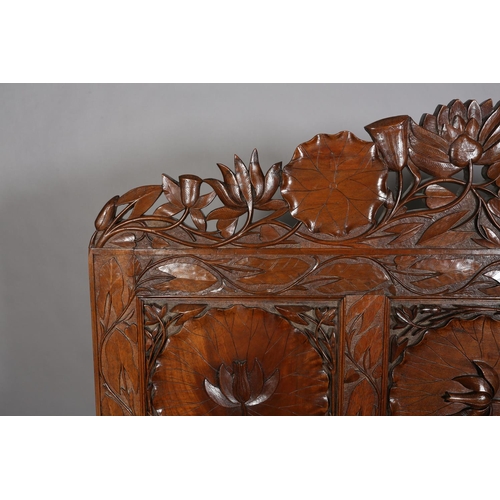 324 - A LATE 19TH CENTURY ANGLO-INDIAN WALNUT SIDEBOARD AND PAIR OF SINGLE CHAIRS, all-over carved in low ... 