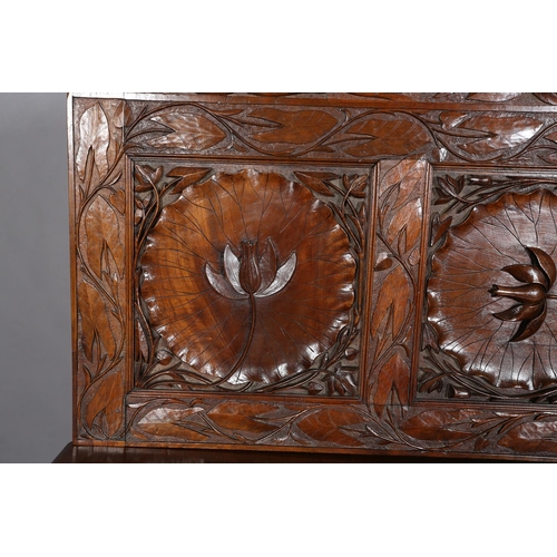 324 - A LATE 19TH CENTURY ANGLO-INDIAN WALNUT SIDEBOARD AND PAIR OF SINGLE CHAIRS, all-over carved in low ... 