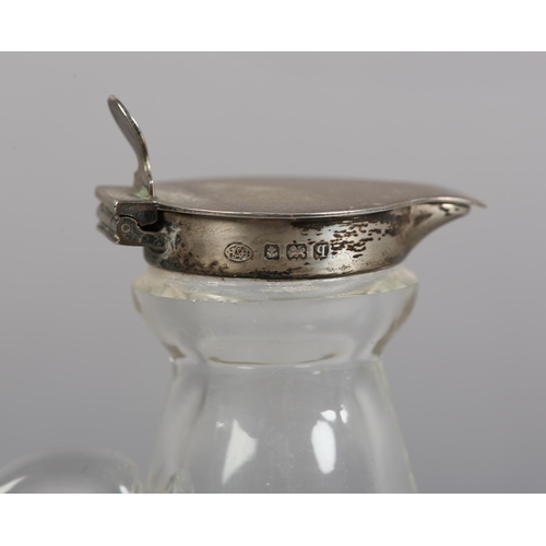 215 - A GEORGE V SILVER TOPPED GLASS WHISKEY NOGGIN, Birmingham 1915 for Hukin & Heath Ltd, conical with s... 