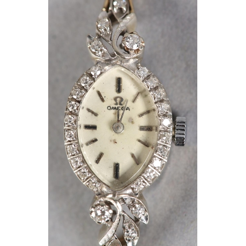 267 - AN OMEGA LADY'S DIAMOND SET MANUAL WRISTWATCH c.1969, the marquise shaped case no. AA7607 38094 with... 