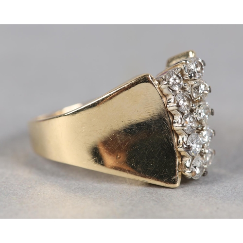 233 - A DIAMOND RING c.1970, the brilliant cut stones claw set in two off set rows flanked by broad convex... 