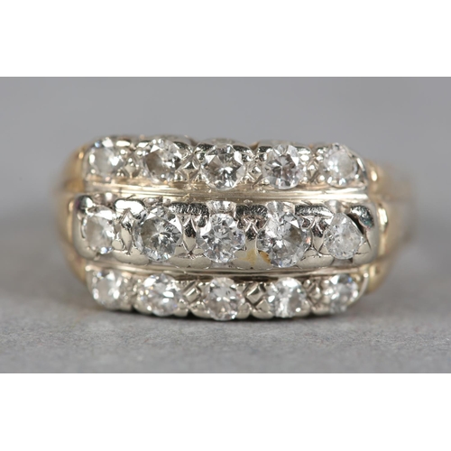 236 - A DIAMOND RING c.1970, the brilliant cut stones set in three rows in line, in yellow and white metal... 