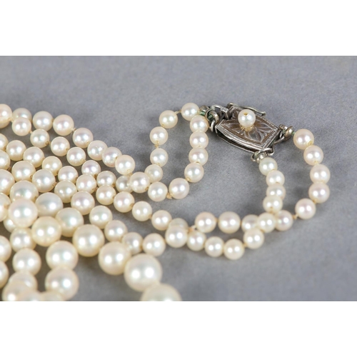 238 - A CULTURED PEARL NECKLACE BY MIKIMOTO c.1960, two rows of graduated pearls, approximate max diameter... 