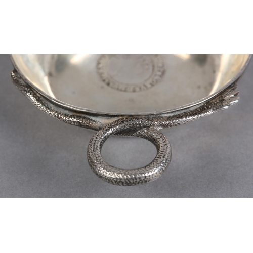 214 - A GEORGE V SILVER WINE TASTER, London 1924 D&J Welby, circular with serpentine handle and coin base,... 