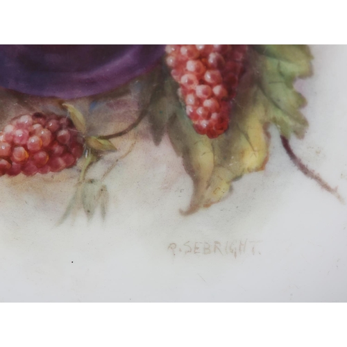 162 - A ROYAL WORCESTER TAZZA hand painted with plums and raspberries to the centre and signed R Sebright ... 