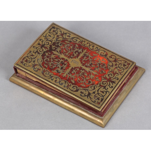 143 - A 19TH CENTURY BOULLE DESK PAD, having cut brass strapwork on a red tortoiseshell ground, etched wit... 