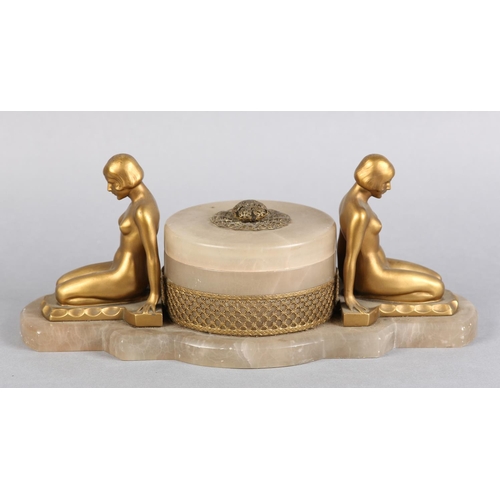 145 - AN ART DECO DRESSING TABLE STAND, the lidded pot having filigree gilt metal mount and finial, surmou... 