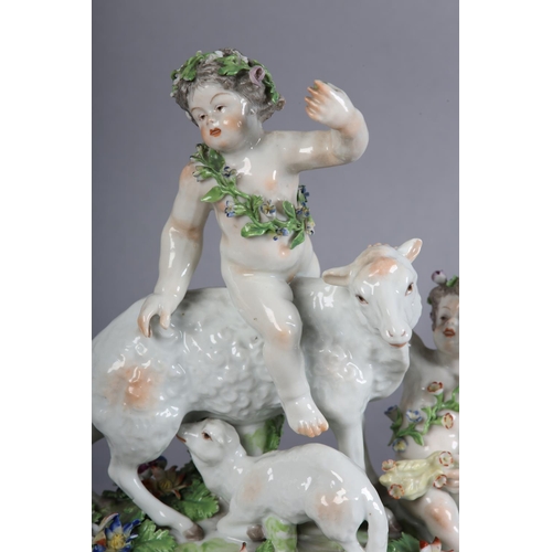 163 - A 19TH CENTURY PORCELAIN FIGURE GROUP OF BACCHUS, atop a sheep with suckling lamb together with anot... 