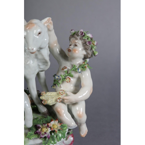 163 - A 19TH CENTURY PORCELAIN FIGURE GROUP OF BACCHUS, atop a sheep with suckling lamb together with anot... 