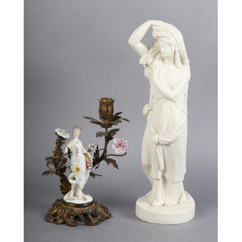 153 - A MID 19TH CENTURY PARIAN FEMALE FIGURE EMBLEMATIC OF AUTUMN raised on a circular base, unmarked, 34... 